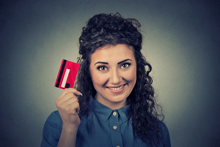 A Woman Holding a Loyalty Reward Card