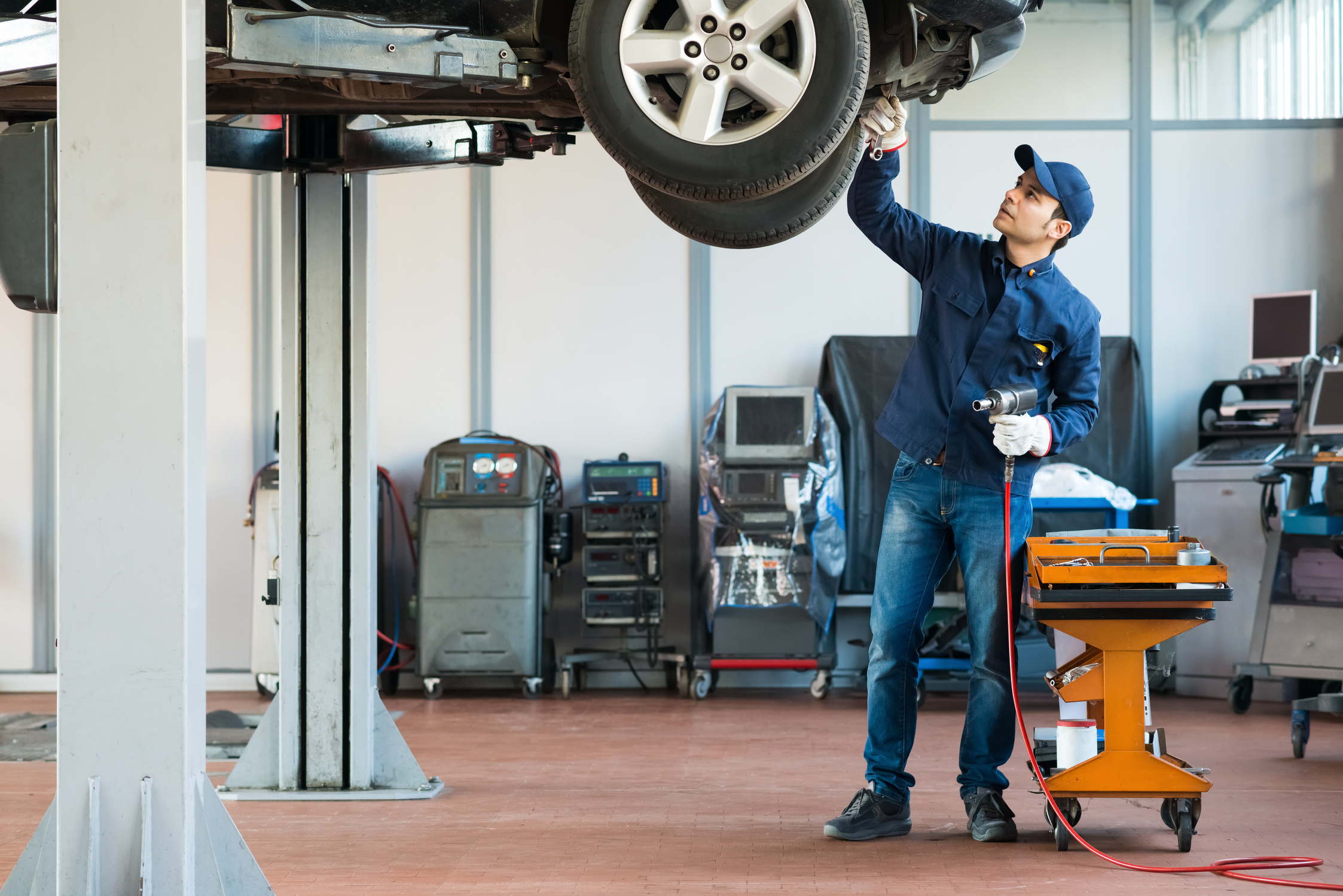 Mechanic working on car