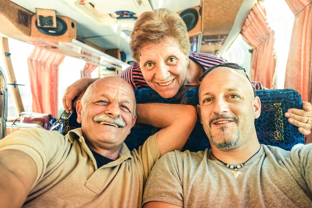 Man travelling with his parents
