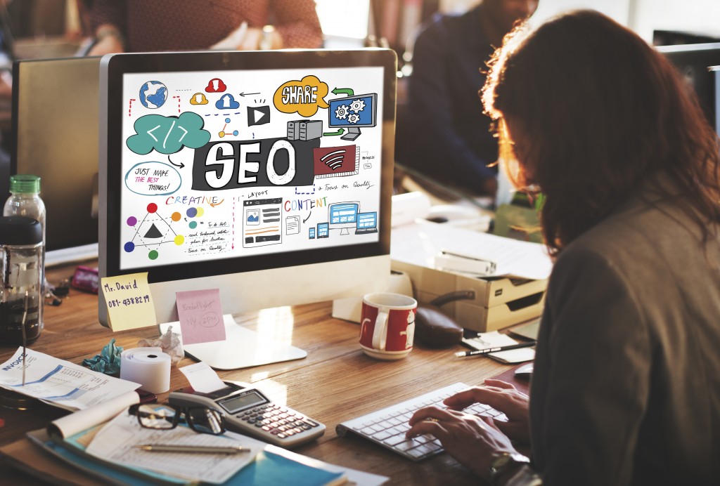 Woman Working on SEO on Computer